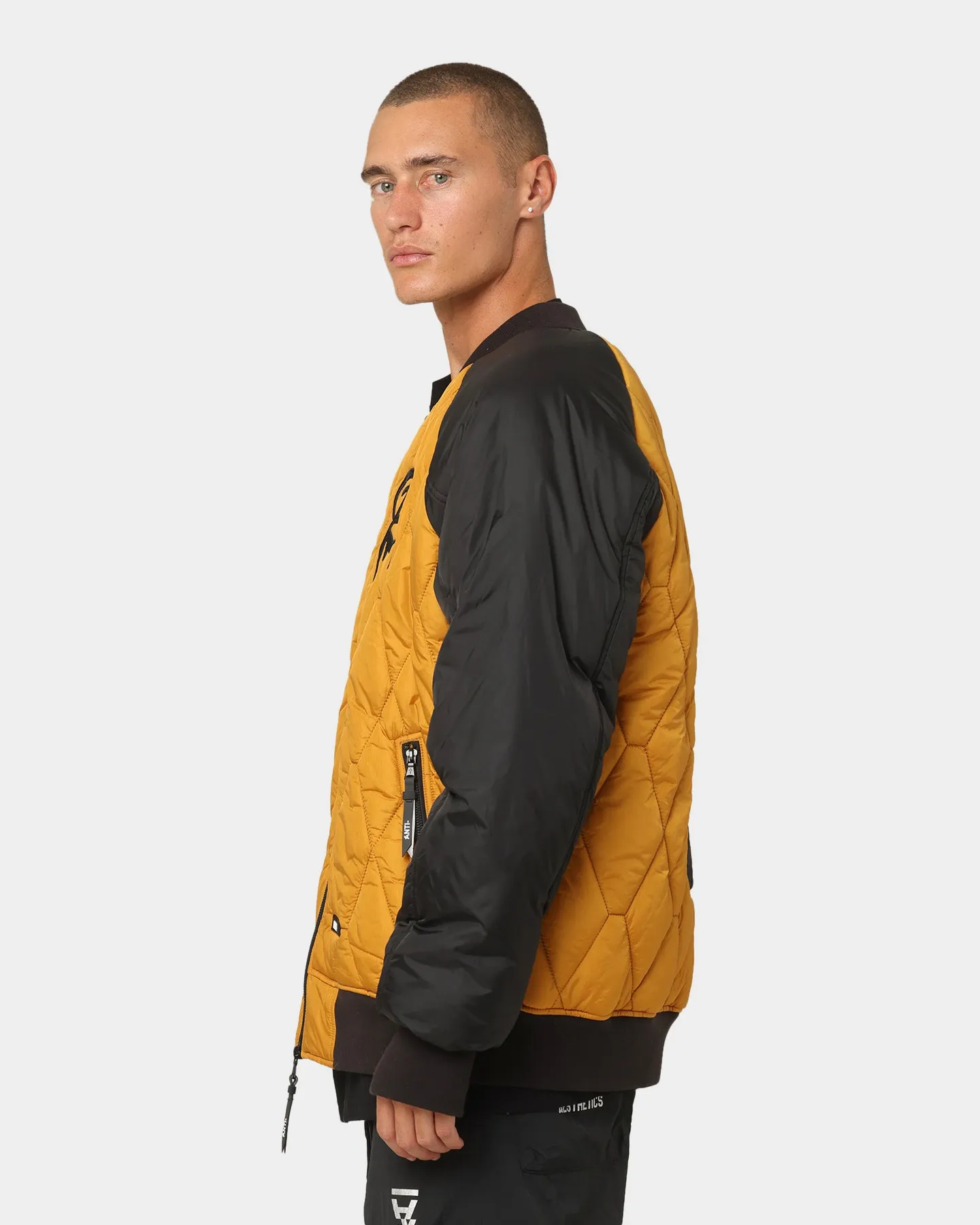 The Anti Order Corvus Quilted Bomber Jacket Mustard/Black/White